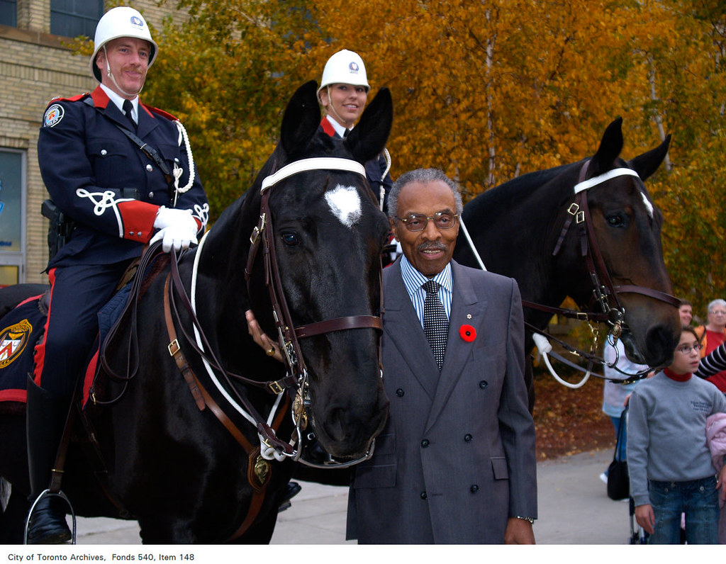 Alexander with police horses at the 2005 Royal Winter Agriculture Fair